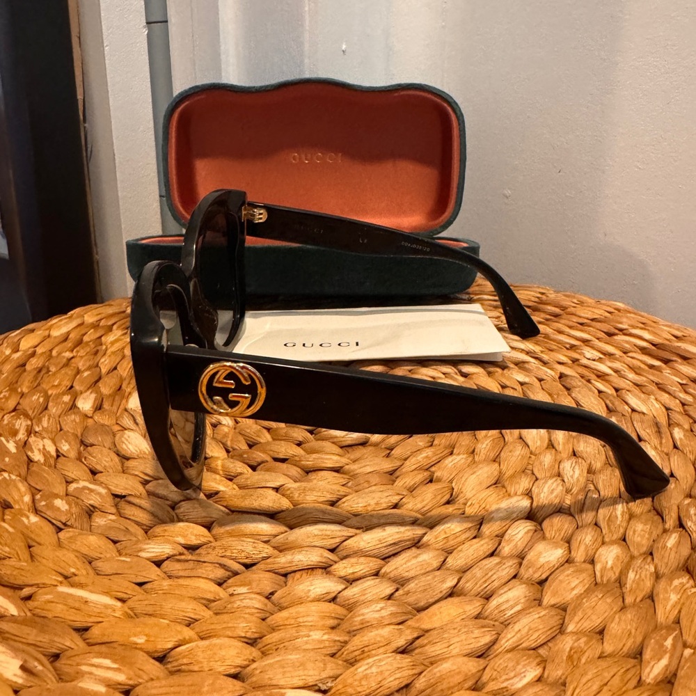 Gucci Black Sunglasses with Gold Emblem
